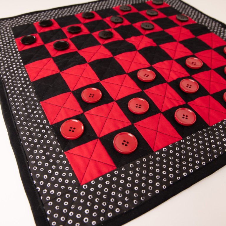 Quilted Checkers Game Board: Fun & Portable for Family Trips